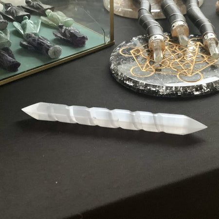 Selenite for massage in the shape of a stick, pencil, mushroom